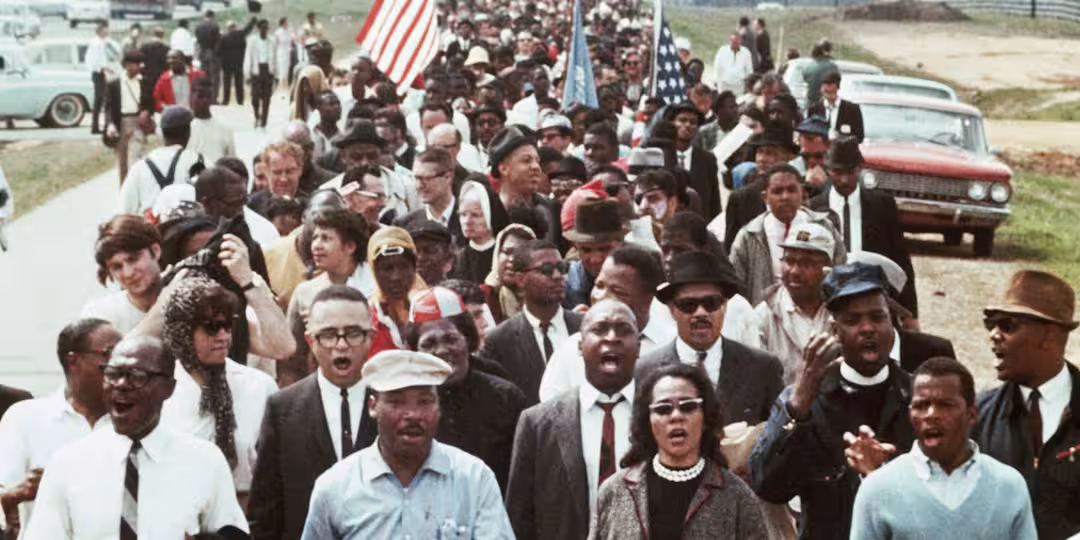 Dr. Martin Luther King Jr. leading marchers.